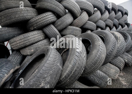 Used car tyres stacked up Stock Photo