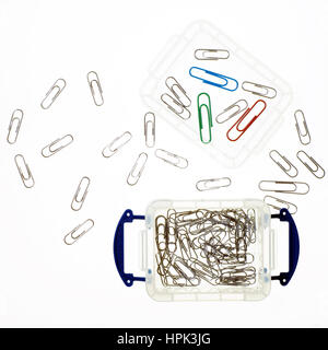 Plastic box containing paper clips Stock Photo