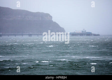 Storm surge sea swell as Storm Doris crashes into North Wales and the coastal resort of Llandudno Stock Photo