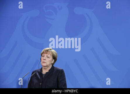 Berlin, Germany. 23rd Feb, 2017. German Chancellor Angela Merkel attends a joint press conference with visiting Lithuanian Prime Minister Saulius Skvernelis (not in picture) in Berlin, capital of Germany, on Feb. 23, 2017. Credit: Shan Yuqi/Xinhua/Alamy Live News Stock Photo