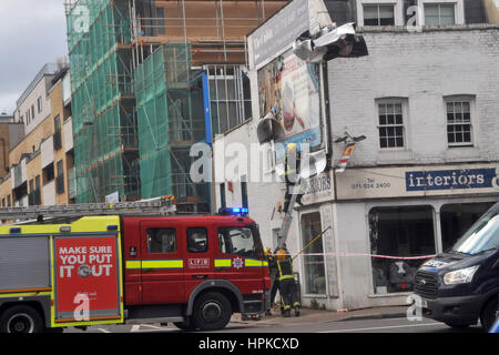 London, UK. 23rd Feb, 2017. UK Weather. London Fire Brigade attend poster in York road, Battersea, Wandsworth, damaged by Storm Doris. Credit: JOHNNY ARMSTEAD/Alamy Live News Stock Photo