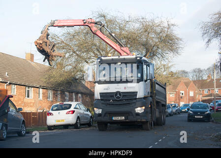 Winchester, Hampshire, UK. 23rd February 2017. UK Weather, Storm Doris devastation across hampshire as two cars are crushed by a large tree in Winnall, Winchester. Credit: Will Bailey/Alamy Live News Stock Photo