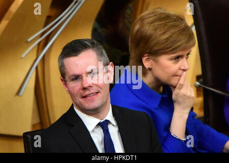 Edinburgh, Scotland, United Kingdom. 23rd February, 2017. Scottish Finance Secretary Derek Mackay and First Minister Nicola Sturgeon await the result of the vote on the final stage of the Scottish budget, which the Government finally carried, Credit: Ken Jack/Alamy Live News Stock Photo