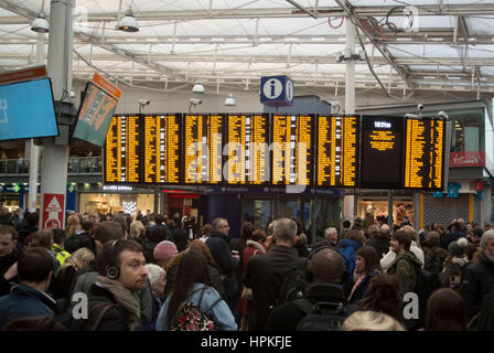 Manchester, UK. 23rd Feb, 2017. Storm Doris ‘Weather bomb' causes severe delays on all trains from Manchester Piccadilly rail station. Commuters warned of cancelled and delayed services as 'all lines are blocked' following 'overhead wire problems'. Departure boards shows severely delayed services. Credit: Bailey-Cooper Photography/Alamy Live News Stock Photo