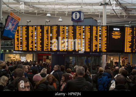 Manchester, UK. 23rd Feb, 2017. Storm Doris ‘Weather bomb' causes severe delays on all trains from Manchester Piccadilly rail station. Commuters warned of cancelled and delayed services as 'all lines are blocked' following 'overhead wire problems'. Departure boards shows severely delayed services. Credit: Bailey-Cooper Photography/Alamy Live News Stock Photo