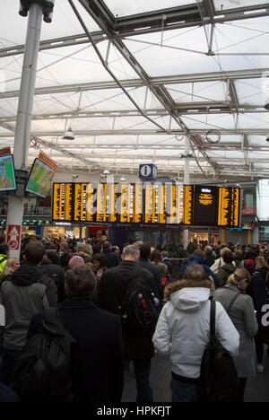 Manchester, UK. 23rd Feb, 2017. Storm Doris ‘Weather bomb' causes severe delays on all trains from Manchester Piccadilly rail station. Commuters warned of cancelled and delayed services as 'all lines are blocked' following 'overhead wire problems'. Departure boards shows severely delayed services. Credit: Bailey-Cooper Photography/Alamy Live News Stock Photo