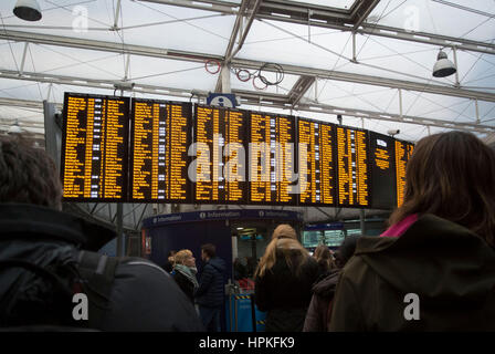 Manchester, UK. 23rd Feb, 2017. Storm Doris ‘Weather bomb' causes severe delays on all trains from Manchester Piccadilly rail station. Commuters warned of cancelled and delayed services as 'all lines are blocked' following 'overhead wire problems'. Departure boards shows severely delayed services. Credit: Bailey-Cooper Photography/Alamy Live News Stock Photo