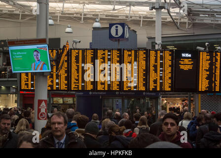 Manchester, UK. 23rd Feb, 2017. Storm Doris ‘Weather bomb' causes severe delays on all trains from Manchester Piccadilly rail station. Commuters warned of cancelled and delayed services as 'all lines are blocked' following 'overhead wire problems'. Departure boards shows severely delayed services. Credit: Bailey-Cooper Photography/Alamy Live News Stock Photo