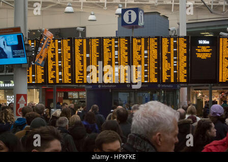 Manchester, UK. 23rd Feb, 2017. Storm Doris ‘Weather bomb' causes severe delays on all trains from Manchester Piccadilly rail station. Commuters warned of cancelled and delayed services as 'all lines are blocked' following 'overhead wire problems'. Departure boards shows severely delayed services. Credit: Bailey-Cooper Photography/Alamy Live News Stock Photo