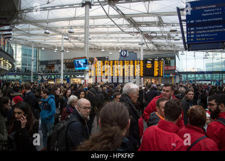 Manchester, UK. 23rd Feb, 2017. Storm Doris ‘Weather bomb' causes severe delays on all trains from Manchester Piccadilly rail station. Commuters warned of cancelled and delayed services as 'all lines are blocked' following 'overhead wire problems'. Departure boards shows severely delayed services. Credit: Bailey-Cooper Photography/Alamy Live News Stock Photo