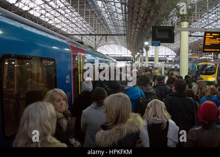Manchester, UK. 23rd Feb, 2017. Storm Doris ‘Weather bomb' causes severe delays on all trains from Manchester Piccadilly rail station. Commuters warned of cancelled and delayed services as 'all lines are blocked' following 'overhead wire problems'. Departure boards shows severely delayed services. Credit: Bailey-Cooper Photography/Alamy Live News Stock Photo