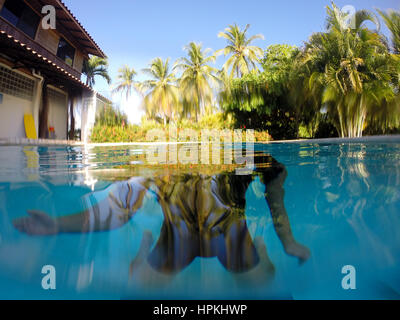 Man in swimming pool Stock Photo