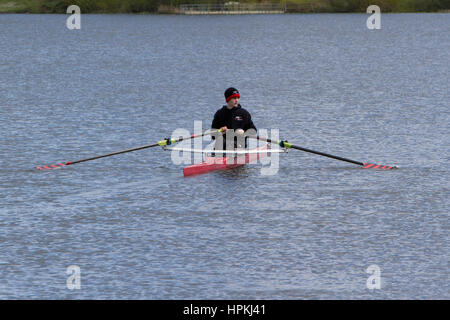 Teenage Rower A teenage rower sportsman, on a river in a singles rowing boat Stock ...