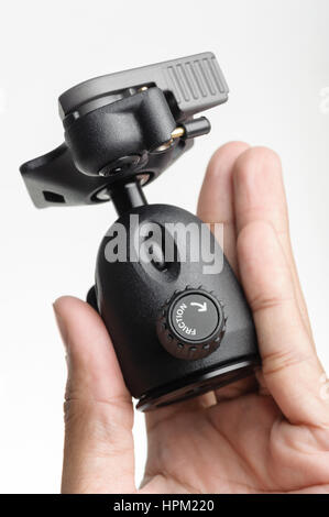 Closeup friction control knob on ball head of tripod Stock Photo