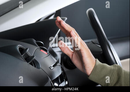 checking the air from air ventilation in the car Stock Photo