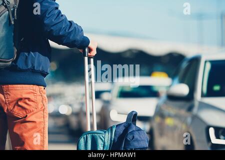 Airport taxi. Passenger is waiting for taxi car. Stock Photo