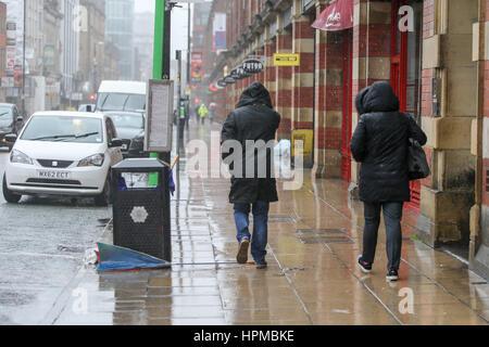 Storm Doris hits commuters in Manchester with heavy rain and wind. Stock Photo