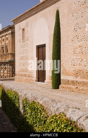 Stone and brick buildings at Alhambra palace grounds, Granada, Spain, Europe.