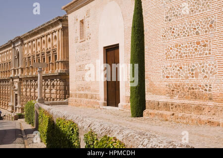 Stone and brick buildings at Alhambra palace grounds, Granada, Spain, Europe.