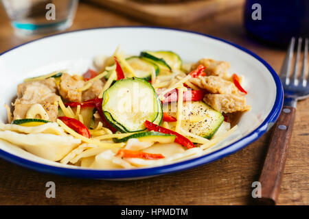 Tortellini with zucchini and soy protein (vegan) Stock Photo