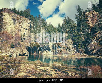 Retro toned picture of Hanging Lake in Glenwood Canyon, Colorado, USA. Stock Photo