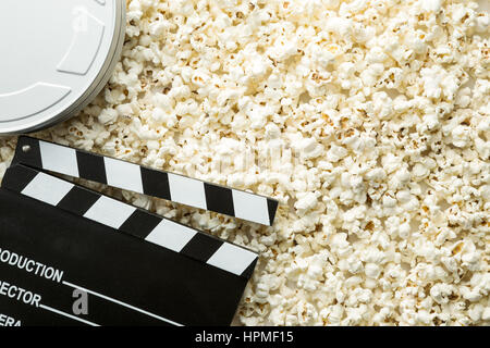 Clapperboard and popcorn. Top view. Stock Photo