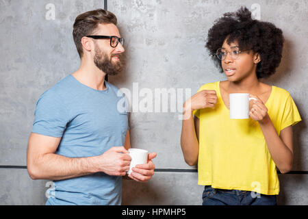 Coworkers having a coffee break Stock Photo