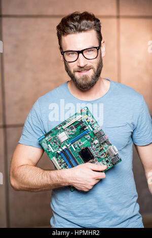 Portrait of a man with digital tablet Stock Photo