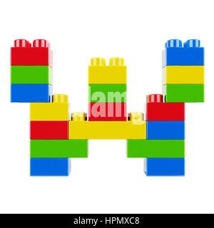 Letter W plastic font alphabet character made of toy construction brick blocks. Isolated on white background Stock Photo