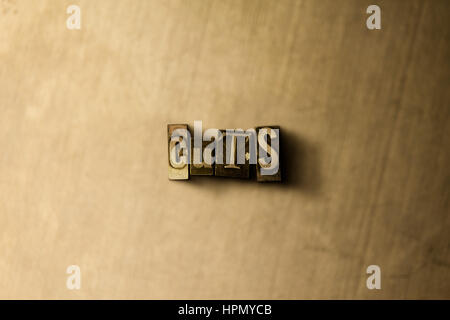 CUTS - close-up of grungy vintage typeset word on metal backdrop. Royalty free stock illustration.  Can be used for online banner ads and direct mail. Stock Photo