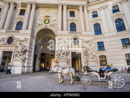 Austria, Vienna, Michaelerplatz, Vienna Hofburg, St. Michael's Wing, view of St. Michael's Gate with monumental Hercules statues Stock Photo