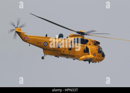 'Sierra 125', a Wattisham based Search and Rescue RAF Sea King HAR3A is caught here departing for the flypast over the Royal newlyweds car on the Mall Stock Photo