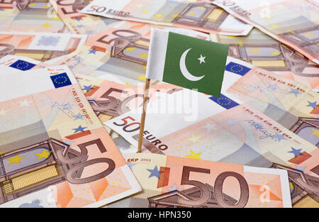 Flag of Pakistan sticking in european banknotes.(series) Stock Photo