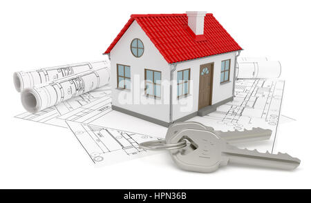 A model home and house key on blueprints Stock Photo