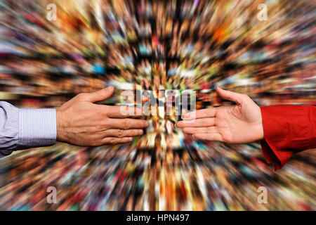 male and female hands reaching out for each other, speed dating concept Stock Photo
