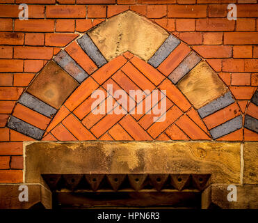 Ornate brickwork detail above window of building, Thirsk, North Yorkshire, UK. Stock Photo