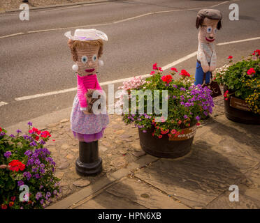 Knitted figures in Market Square, Thirsk, North Yorkshire, UK. Stock Photo