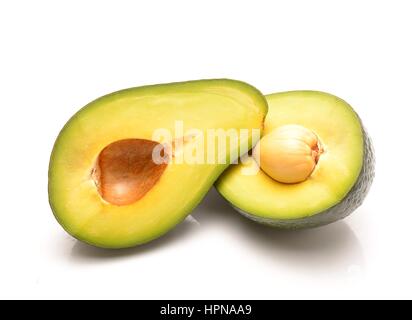Fresh avocado fruits isolated on white Stock Photo