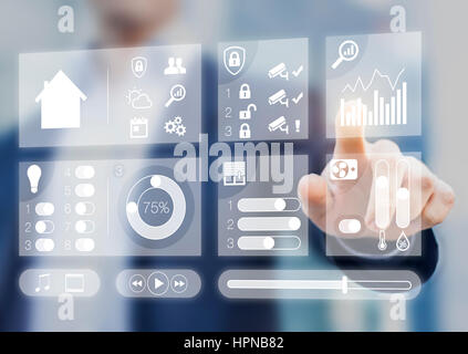 Smart home automation assistant dashboard screen using augmented reality (AR) to create holographic interface to control lights, shutters, air conditi Stock Photo