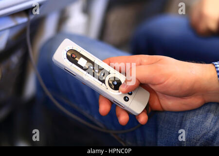Control panel of passenger airplane tv in hand Stock Photo