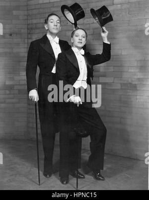 Noel Coward and Gertrude Lawrence, 1936, as George and Lily Pepper, in 'Red Peppers', a one-act play in Noel Coward's play 'Tonight at 8:30'.  This Broadway production played at the National Theatre.    To see my other vintage images, Search:  Prestor  vintage Stock Photo