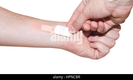 Bandaid on hand isolated on white background Stock Photo