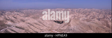 Panoramic view of Wadi Qelt also Wadi Kelt or Nahal Prat (Hebrew??) a valley at the Judaean or Judean desert in the West Bank, originating near Jerusalem and terminating near Jericho. Israel Stock Photo