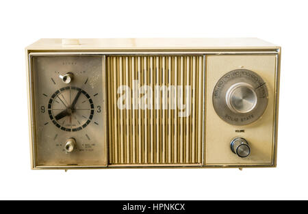 Old battered plastic clock radio with AM rotary dial and clock with snooze feature from seventies Stock Photo