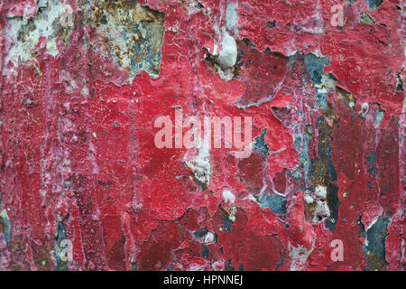 Red Cracked Paint on Wall Stock Photo