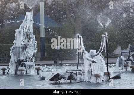 A photograph of a frozen Tinguely Fountain in Basel, Switzerland, during a cold week in Winter. Jean Tinguely was a Swiss paintor and sulptor and is b Stock Photo