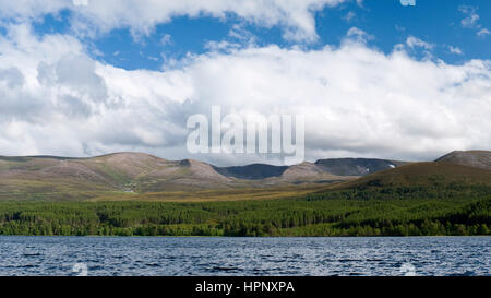 View across Loch Morlich to Cairn Gorm and the Northern Corries, the northern extent of the Cairngorms plateau, near Aviemore Stock Photo