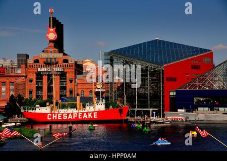Baltimore, Maryland - July 22, 2013:  Lightship Chesapeake moored in front of the Power Plant commercial complex with a Barnes & Noble Bookstore and t Stock Photo