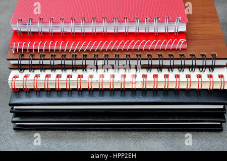 Piled elegant notebooks Stock Photo