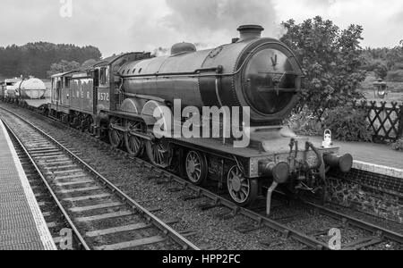 LNER B12 4-6-0 8572 Steam Train passing through Weybourne Station on the North Norfolk Railway with a demonstration goods trains Stock Photo